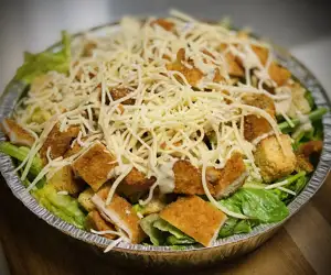 Our Caesar Salad with Breaded Chicken Cutlet 