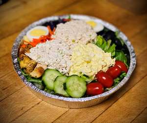Three Scoop Salad (Garden Salad with one Scoop of our Homemade Chicken Salad, Egg Salad and Tuna Salad on top)