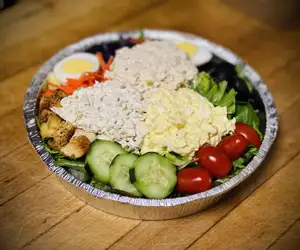Three Scoop Salad (Garden Salad with one Scoop of our Homemade Chicken Salad, Egg Salad and Tuna Salad on top)